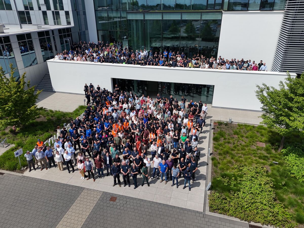 Foto de grupo no Reynaers Campus.